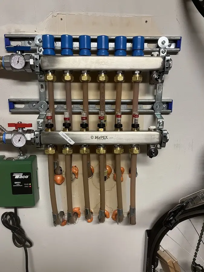 Plumber performing Water Heater Repair at a residential property in Longview Heights